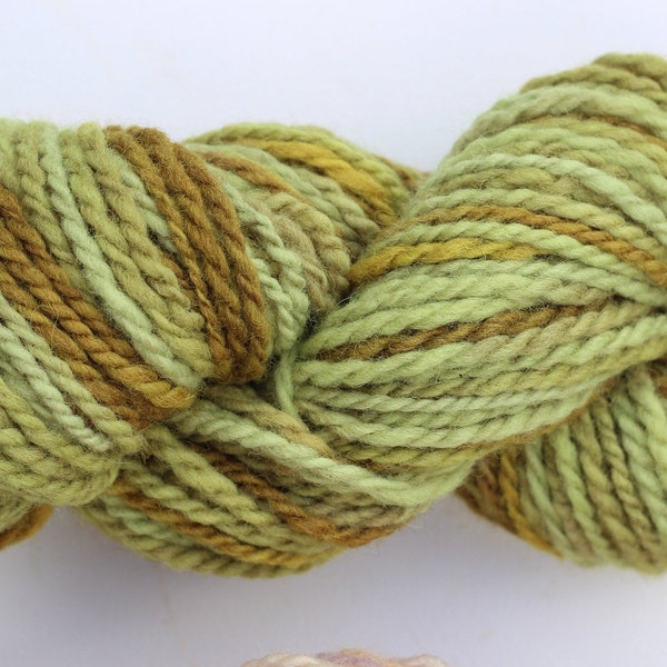 Handspun plant dyed Shetland aran/chunky weight, red onion skin dye, green varigated self striping soft yarn