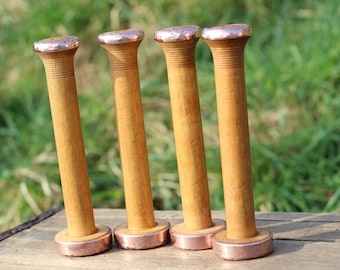 Named copper bound 8" antique weaving mill bobbins, 'Wilkinsons Ltd, Heysham England', collectors item.