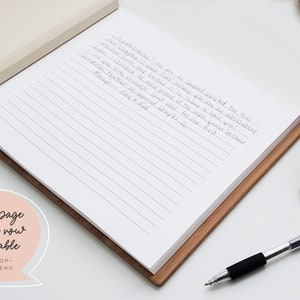 Guest book open on table showing white inside pages with lined paper option