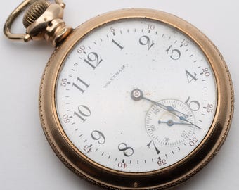Antiguo reloj de bolsillo Waltham de oro laminado eduardiano con 15 joyas - Funcionando