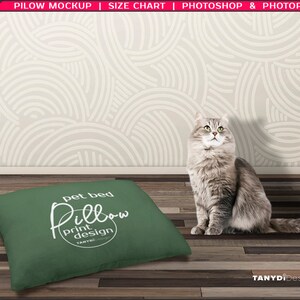 May include: A green pet bed pillow with the text "pet bed Pillow print design TANYDI" in white. A gray cat is sitting on a wooden floor in front of the pillow.