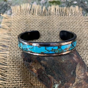 Kingman Turquoise Iron Cuff Bracelet.  4 X 14.5mm Thick and Wide.  Mixed King Man Turquoise Inlay. Please read all the description.