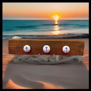 アンカー型取っ手と再生木材を使用した壁掛けコートラック。沿岸スタイル