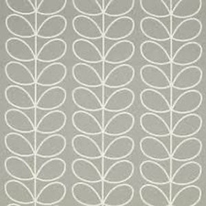 May include: A light grey background with a repeating pattern of white, stylized leaf shapes. The leaves are arranged in vertical columns, creating a textured, organic design suitable for wallpaper or fabric.