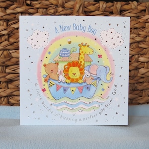 Nieuwe babyjongen christelijke kaart