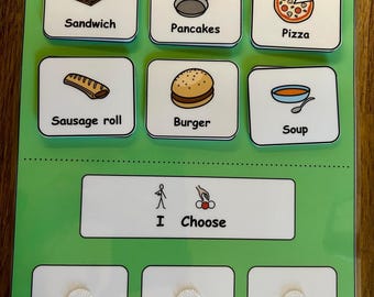 May include: A green My Choice Board with six food-themed picture cards labeled Sandwich, Pancakes, Pizza, Sausage roll, Burger, and Soup. Below is an I Choose section with three blank white squares featuring circular hook-and-loop fasteners.