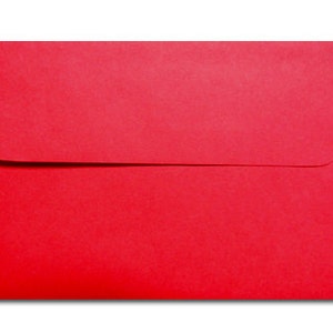 May include: A bright red envelope with a flap.