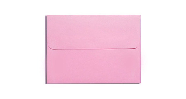 May include: A light pink envelope.