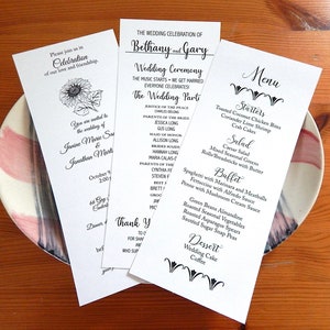 May include: Three white cards with black text. The first card is a wedding invitation for Janine Marie and Jonathan Martin. The second card is a wedding program for Bethany and Gary. The third card is a menu for the wedding reception. The menu includes starters, salad, buffet, and dessert.