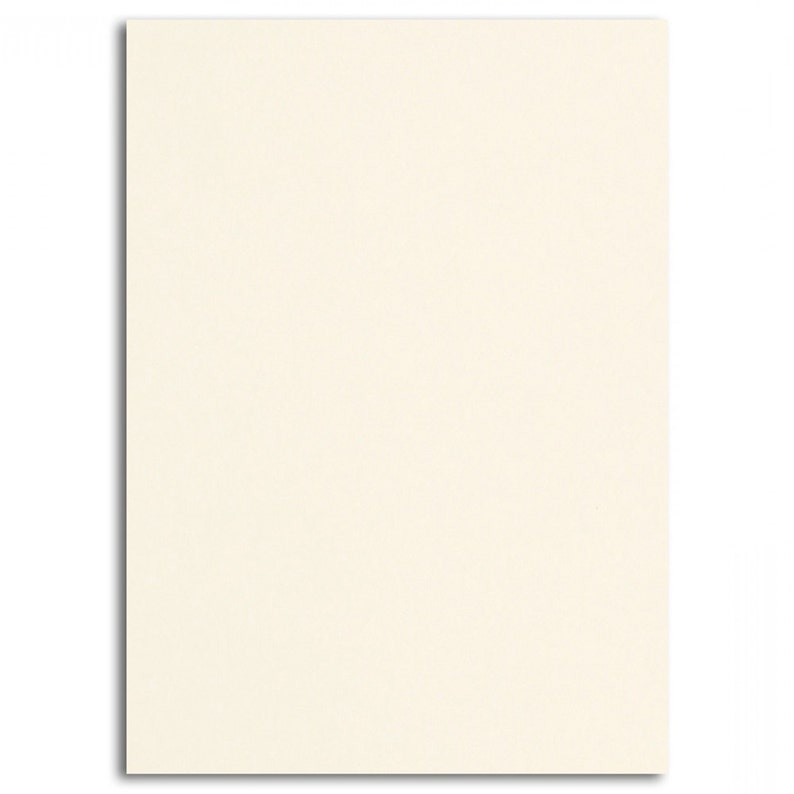May include: A blank, off-white card with a smooth, textured surface.