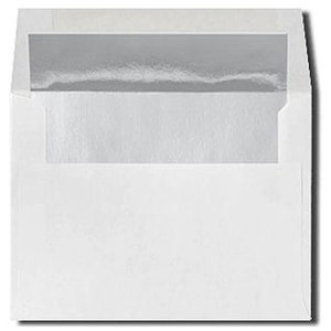 May include: A white envelope with a silver metallic lining visible through the open flap. The envelope is rectangular and appears to be made of paper. The interior lining has a shiny, reflective surface.