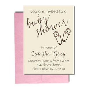 May include: A cream-colored baby shower invitation with a pink envelope. The invitation features a handwritten script that says "you are invited to a baby shower" with a pair of safety pins drawn above the text. The invitation also includes the name "Latasha Grey" and the details of the shower: "Saturday June 16 from 2-4 pm, 3349 Grove Street, Please RSVP by June 1st."