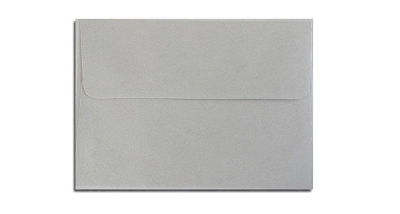 May include: A square, pale grey envelope with a flap closure. The envelope is made of textured paper and is isolated on a white background. The envelope is a neutral colour, suitable for various occasions.