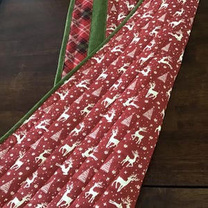 Reindeer Lights Quilted Table Runner NCU0PTT1402