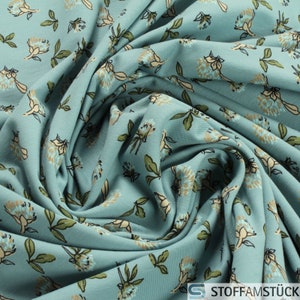 0.5 metre Fabric Cotton Elastane Single Jersey pastel turquoise flower stretchy soft