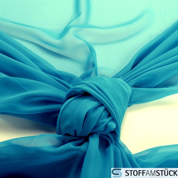 Tissu mousseline de polyester aqua transparent, drapé légèrement doux