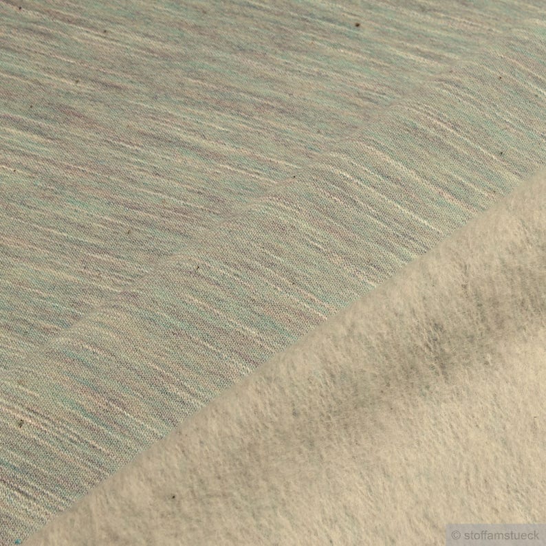 Fabric cotton polyester elastane single jersey pastel turquoise mottled roughened winter-sweat