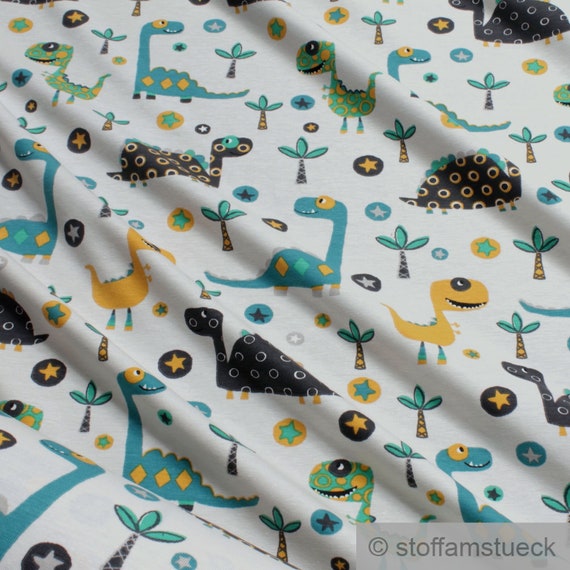 Stoff Kinderstoff Baumwolle Elastan Single Jersey hellbeige Dino