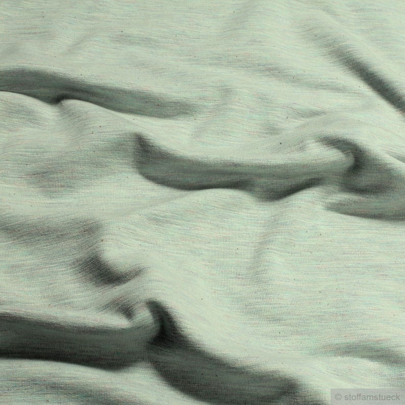 Fabric cotton polyester elastane single jersey pastel turquoise mottled roughened winter-sweat