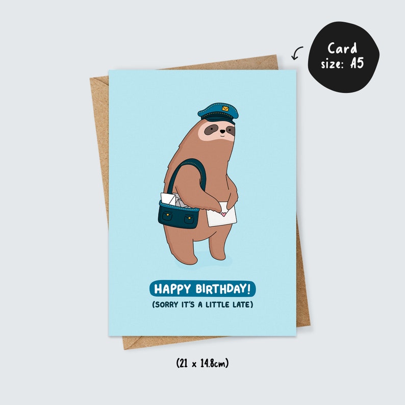 May include: A greeting card featuring a cartoon sloth wearing a blue postal worker hat and carrying a bag of mail. The card reads "Happy Birthday! (Sorry it's a little late)" and measures 8.27 inches by 5.83 inches.