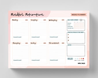 May include: A pink and white weekly planner with the title "Mindful Motivation". The planner has sections for each day of the week, including Monday, Tuesday, Wednesday, Thursday, Friday, and the weekend. There is also a section for self-care and positive picks of the week. The planner has a minimalist design with a pink and white color scheme.