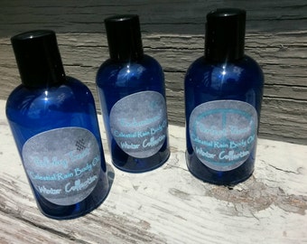 3 4oz Bottles of Body Oil from the "Winter Collection", Holiday Treat, Frozen Enchantment and Perfect Peace.