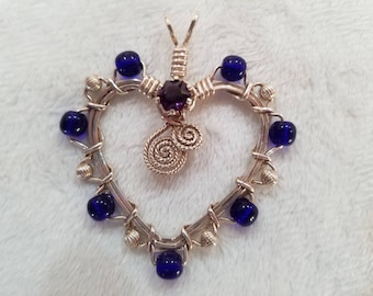 Wire-Wrapped Heart Shaped Pendant with a Faceted Purple Stone