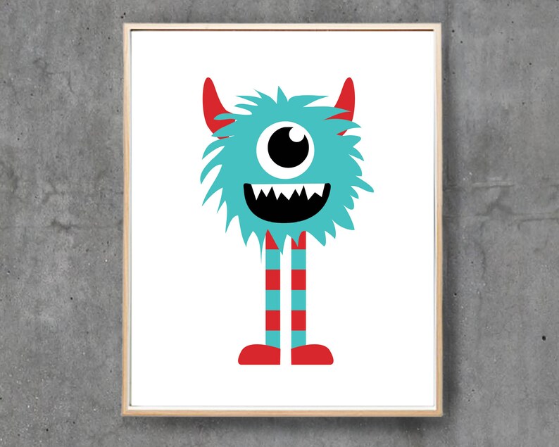 May include: A framed print featuring a whimsical monster illustration. The monster has a turquoise body, red horns, and striped legs. It has a large, single eye and a wide, toothy grin, all set against a white background.