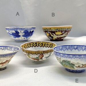 May include: Five decorative ceramic bowls with intricate designs. The bowls feature various patterns, including floral, dragon, and landscape motifs. Colours include blue, white, yellow, and brown. The bowls are of varying sizes and shapes, showcasing traditional craftsmanship.