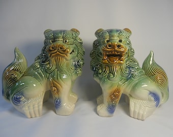 Vintage porcelain foo dogs one pair mid 20th Century unused from old stock