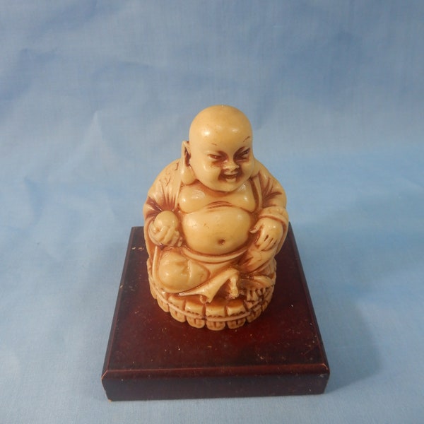 Vintage hand carved Japanese Buddha resin netsuke circa late 20th Century