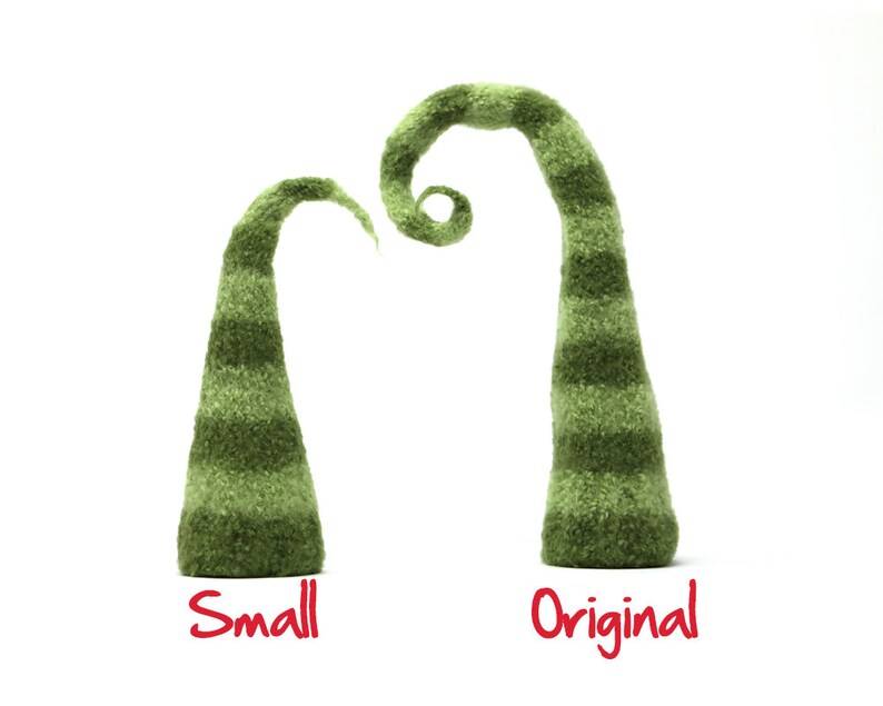 May include: Two green felt gnome hats, one is a smaller version of the other. The larger hat is curled at the top. The smaller hat is straight. The hats are labeled "Original" and "Small".