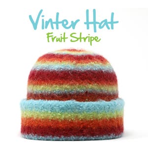 May include: A colorful striped winter hat with red, orange, yellow, green, and blue stripes. The hat is made of a soft, fuzzy material. "Winter Hat Fruit Stripe" is written in blue text above the hat.