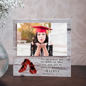 May include: A handmade wooden sign with the text "Welcome" in a playful font. The sign features a distressed white background and a dark brown border, perfect for a front door or entryway. The sign measures approximately 12 inches wide and 6 inches tall.
