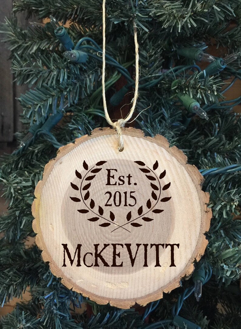 Laser Engraved Wood Ornament Personalized with The Family Last name and the established year
