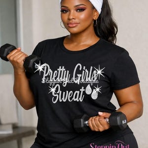 May include: A black t-shirt with the text "Pretty Girls Sweat" in a rhinestone design. The person is holding two black dumbbells, each weighing 8 lbs. The person is wearing a white headband and black leggings.