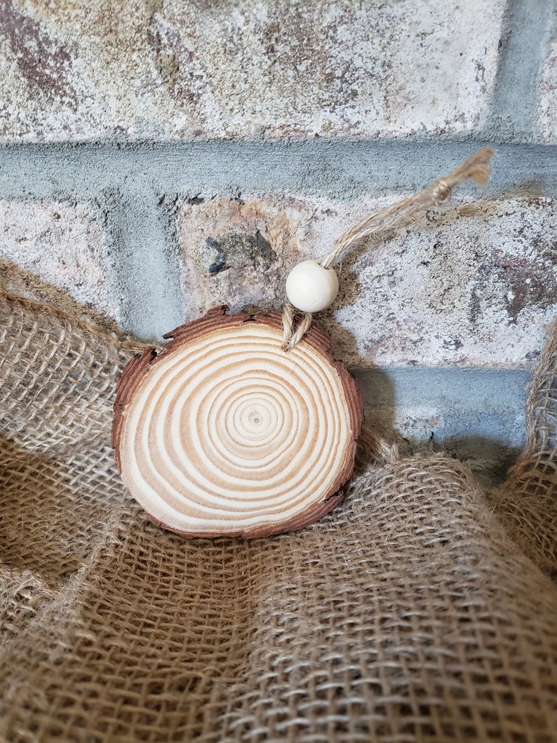 Dog paw wood slice ornament