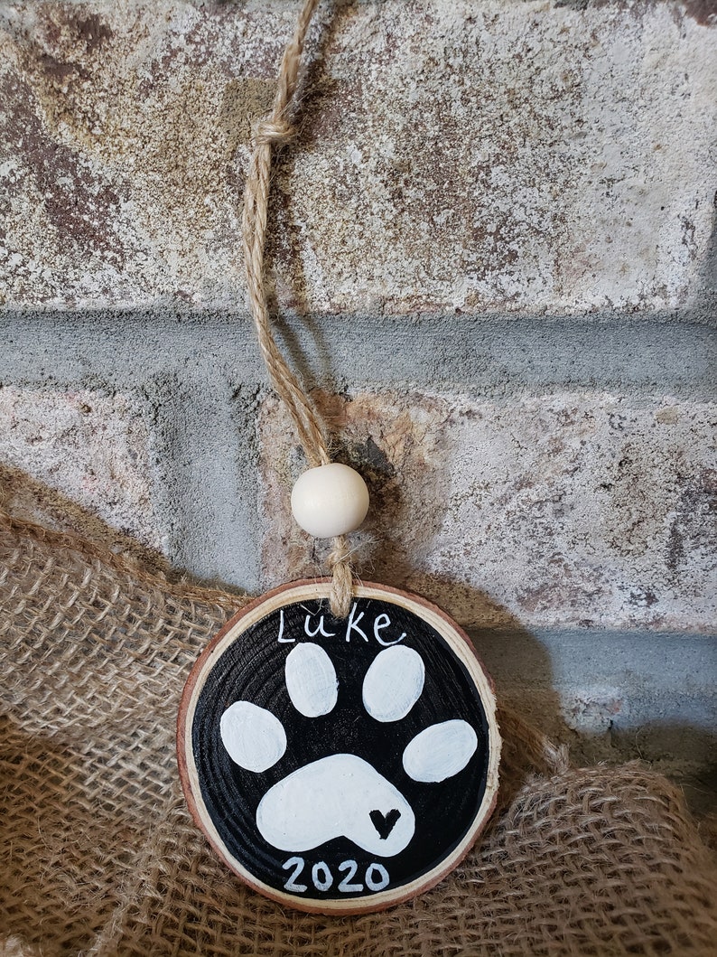 Dog paw wood slice ornament