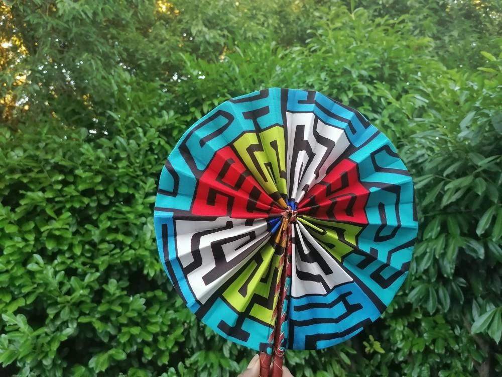 Wax and leather fan with “fan of you” case