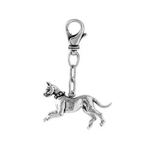 May include: Silver keychain featuring a detailed, three-dimensional sculpture of a Doberman Pinscher dog.