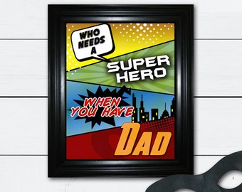 May include: A framed print with a comic book style design. The print says "Who needs a superhero when you have Dad".