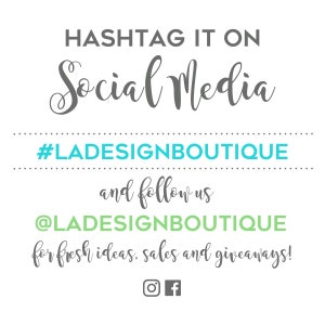 May include: A white background with gray text that says "HASHTAG IT ON Social Media" and "#LADESIGNBOUTIQUE and follow us @LADESIGNBOUTIQUE for fresh ideas, sales and giveaways!" with Instagram and Facebook icons.