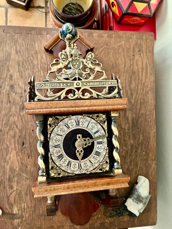 Vintage Zaanse Wall Clock – Brass Atlas, Mid-century Dutch
