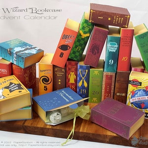 May include: A wizard-themed advent calendar with 24 small boxes shaped like books. Each box has a different title and number. The boxes are stacked in a pyramid shape. The calendar is made of paper and is decorated with a variety of magical themes.