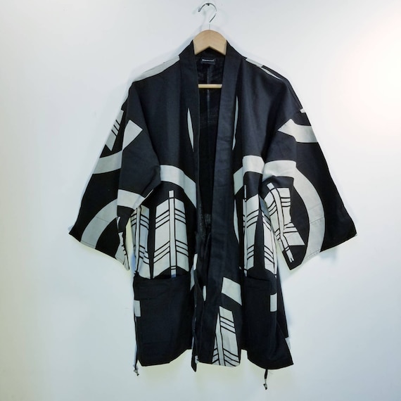 Chaqueta tipo kimono samurái japonesa con escudo de flechas