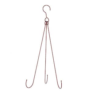 May include: A brown metal hanging plant stand with three hooks. The stand has a single hook at the top and three hooks at the bottom.