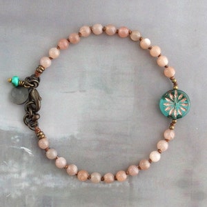 Knotted sunstone bracelet with starburst glass bead, Peach gemstone bracelet, Dainty Czech glass bracelet, One of a kind jewelry gift