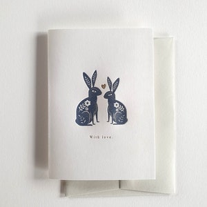 Con amor, liebres, tarjeta de felicitación impresa con tipografía, amor, amistad