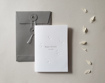 Carte de joyeux anniversaire en aluminium et en typographie