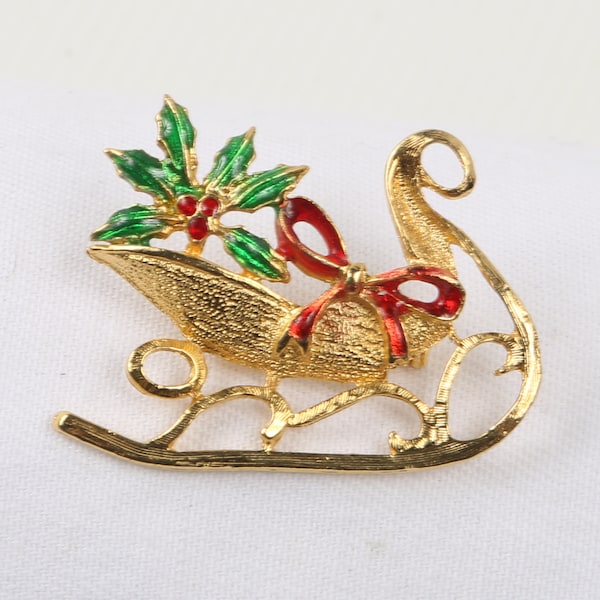 1970's Christmas Sleigh Pin. Green and Red Enamel on Gold Tone. Openwork Graceful Design. Near MINT Condition. Rollover Clasp.